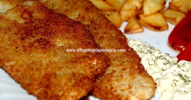 Pescada empanada con patatas fritas y pimientos del piquillo