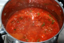 Agregar tomate troceado