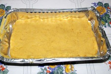 Poner masa en el molde