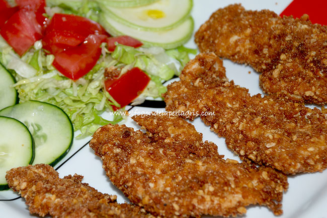 Pollo empanado con kikos