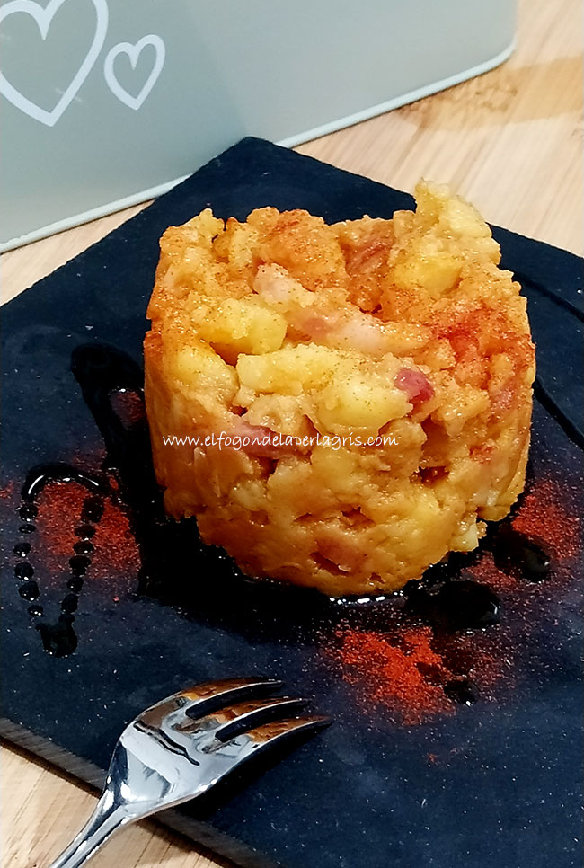 Faldo timbal patatas revolconas